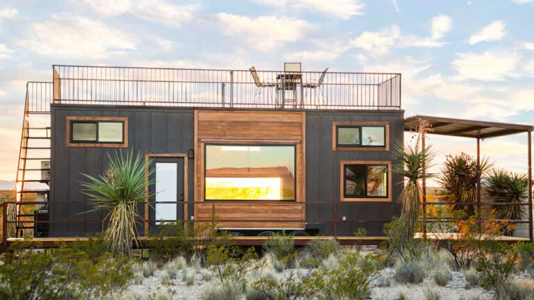 30 ft. Tiny House has Covered Porch and Expansive Rooftop Deck