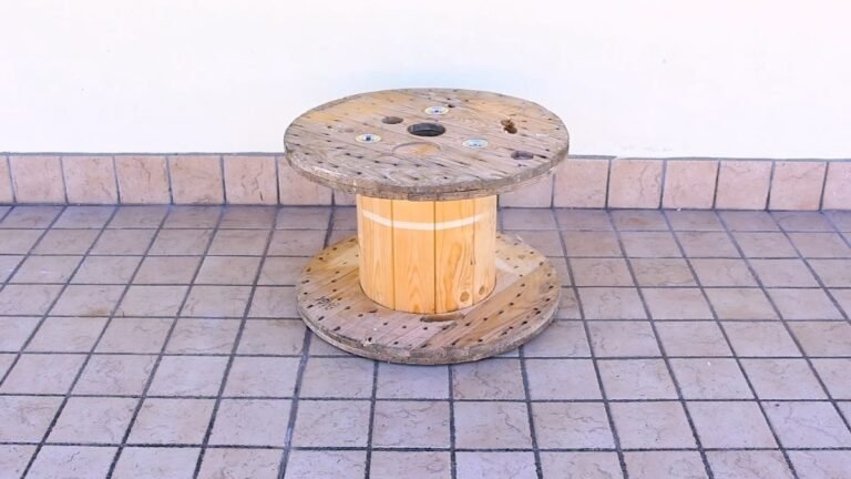 A Wooden Cable Spool Became a Spinning Coffee Table With Built-In Book Storage