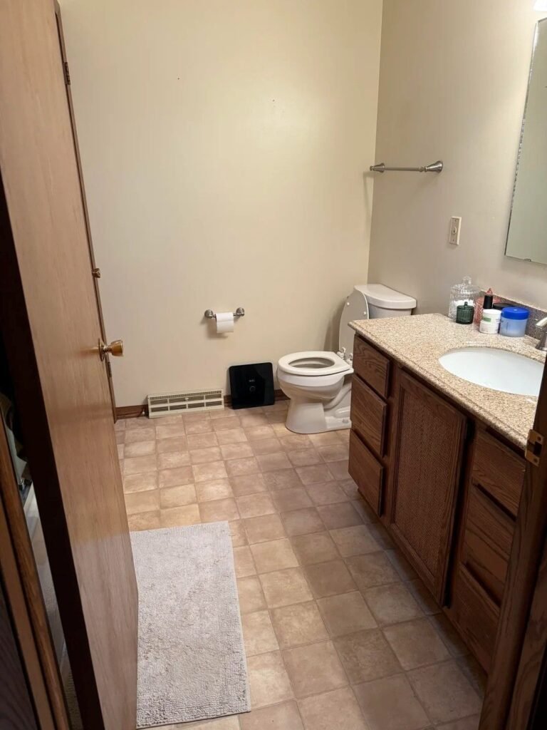 Pink Tile Replaced Builder-Grade Beige and the Bathroom Took On a Boutique Hotel Look