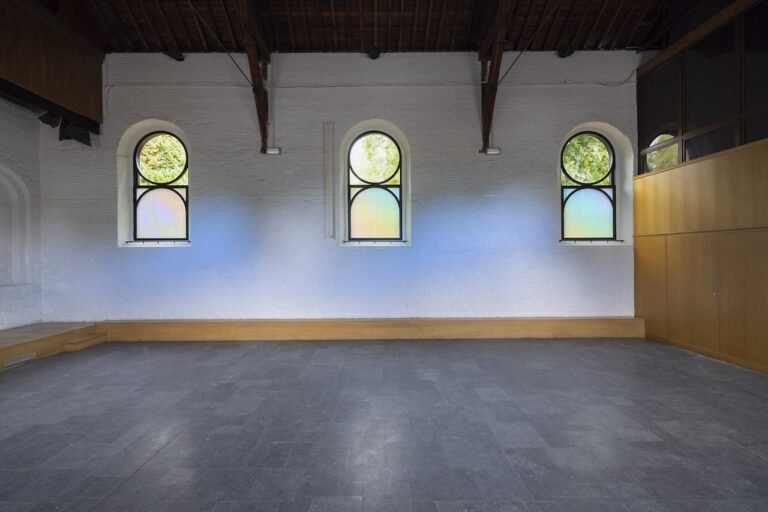 Jordan Soderberg Mills Installs Prismatic Chapel Windows