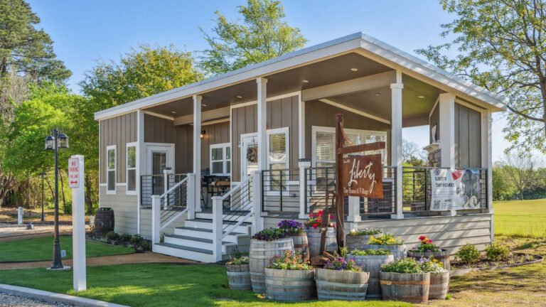 Single-Level Liberty Landing Tiny House Puts Stone Fireplace on Porch