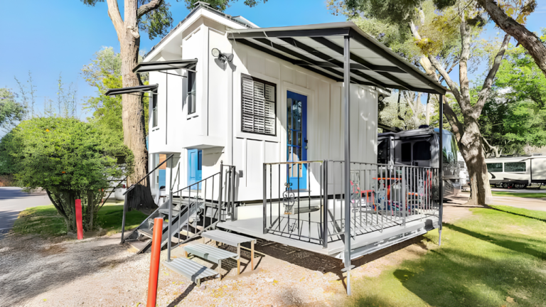 Tiny House in Utah Flaunts Covered Front Porch, Cocooning Loft