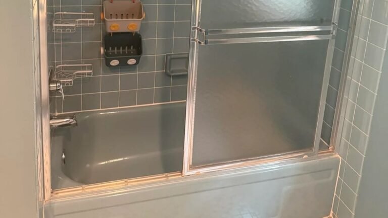They Spent $18K Remodeling This Blue Bathroom, but Everyone Wanted the Old Tile Back