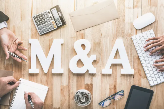 AI, M&A demands test CFOs as dealmaking rebounds: Bain