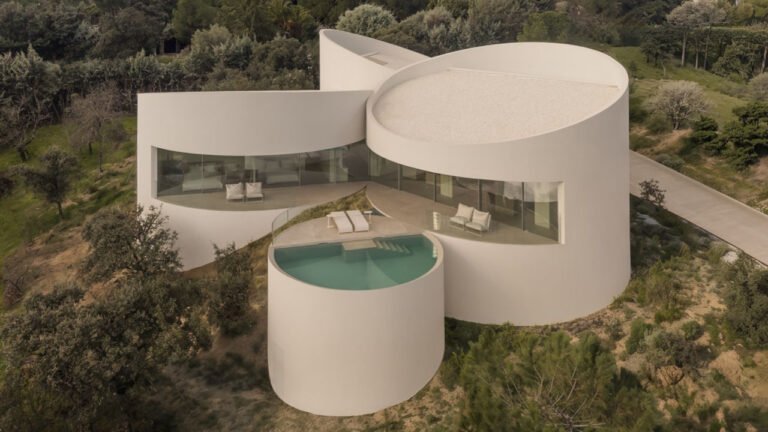 Las Rozas House has Sculptural Façade With 5 Slanted Cylindrical Forms