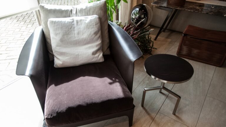 Not Just Sofas and Beds: Throw Pillows Are Showing Up on Armchairs