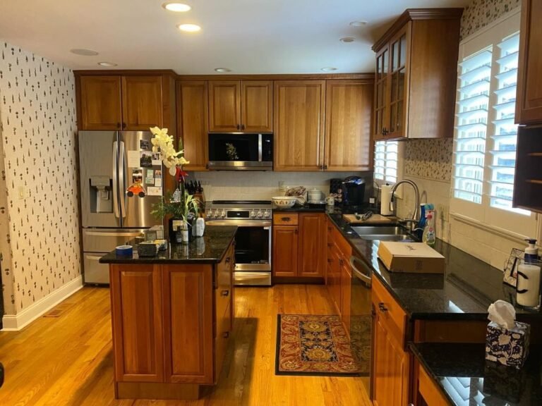 Orange Wood Cabinets Went Deep Green and the Kitchen Felt Much More Open