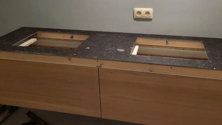 The Stone Countertop Doesn’t Stop at the Counter in This Bathroom