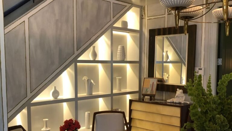 Under-the-Stairs Shelving Is Becoming a Display Wall Instead of Storage
