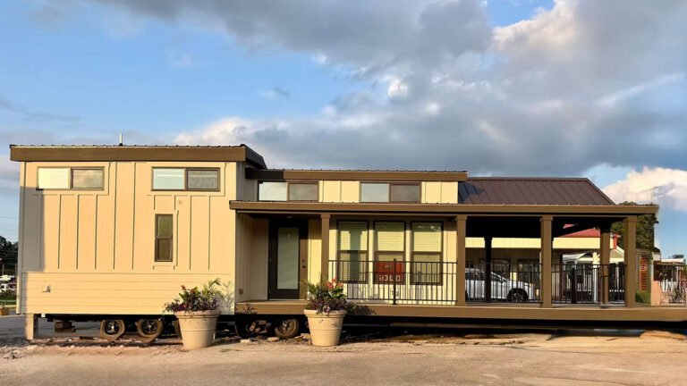 Extra Wide Wheeler Tiny House has Porch and Glass Shower